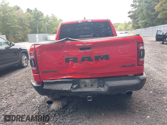 2021 Ram 1500 Rebel with VIN 1C6SRFLT2MN591844, listed as a IAAI auction lot 40410248 with 84,759 mi miles and . Bid and sale history available at DreamBid. Image 16.