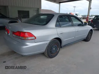 2001 Honda Accord LX with VIN 1HGCG55401A063548, listed as a IAAI auction lot 42651792 with 215,058 mi miles and . Bid and sale history available at DreamBid. Image 4.