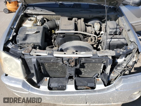 2005 GMC Envoy SLE with VIN 1GKDT13S652171203, listed as a Copart auction lot 49087815 with 292,815 mi miles and Salvage Title. Bid and sale history available at carsss.com. Image 13.