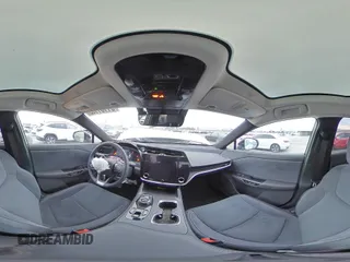 2023 Lexus RZ 450e Premium z VIN JTJAAAAB5PA009849, wystawiony jako Copart lot #81161103 z przebiegiem 4056 mil mil oraz . Historia ofert i sprzedaży dostępna na DreamBid. Obrazek 14.