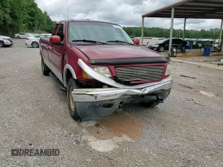 2000 Ford F-150 XL z VIN 1FTRX18LXYNB45648, wystawiony jako Copart lot #60152425 z przebiegiem 92 774 mil mil oraz Szkoda całkowita • Salvage title. Historia ofert i sprzedaży dostępna na DreamBid. Obrazek 12.