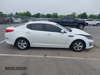 2014 Kia Optima LX with VIN KNAGM4A7XE5481131, listed as a IAAI auction lot 42494495 with 97,223 mi miles and . Bid and sale history available at DreamBid. Image 14.