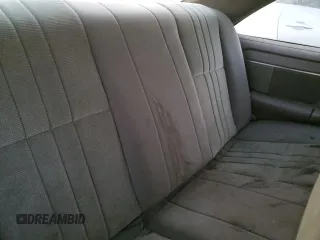 1989 Ford Thunderbird z VIN 1FAPP6047KH147586, wystawiony jako Copart lot #81057294 z przebiegiem 249 369 mil mil oraz Szkoda całkowita • Salvage title. Historia ofert i sprzedaży dostępna na DreamBid. Obrazek 10.