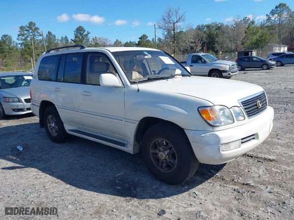 2002 Lexus LX 470 with VIN JTJHT00W123522570, listed as a IAAI auction lot 41739017 with 266,396 mi miles. Bid and sale history available at carsss.com. Image 1.