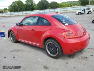 2012 Volkswagen Beetle 2.5L w/Sun PZEV with VIN 3VWJP7AT2CM617674, listed as a Copart auction lot 61290874 with 142,227 mi miles and Salvage Title. Bid and sale history available at carsss.com. Image 2.