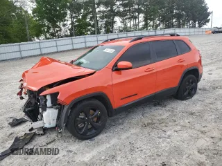 2021 Jeep Cherokee Altitude with VIN 1C4PJLLBXMD134300, listed as a Copart auction lot 54477235 with 153,002 mi miles and Salvage title. Bid and sale history available at DreamBid. Image 1.