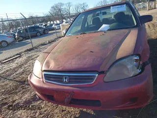 1999 Honda Civic LX with VIN 1HGEJ6579XL014663, listed as a IAAI auction lot 41250453 with 251,342 mi miles. Bid and sale history available at carsss.com. Image 12.
