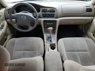 2001 Mazda 626 LX with VIN 1YVGF22CX15238033, listed as a Copart auction lot 47245985 with 91,735 mi miles and Salvage Title. Bid and sale history available at carsss.com. Image 8.