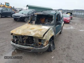 1998 Ford Explorer XL with VIN 1FMZU34E6WUA39787, listed as a IAAI auction lot 41905514 with 198,306 mi miles and . Bid and sale history available at DreamBid. Image 6.