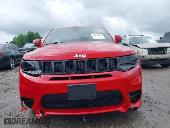 2017 Jeep Grand Cherokee SRT z VIN 1C4RJFDJXHC670370, wystawiony jako IAAI lot #41524965 z przebiegiem 87 276 mil mil oraz . Historia ofert i sprzedaży dostępna na DreamBid. Obrazek 13.
