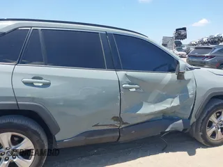 2020 Toyota RAV4 XLE with VIN 2T3W1RFV0LW069849, listed as a IAAI auction lot 42138074 with 112,062 mi miles and . Bid and sale history available at DreamBid. Image 6.