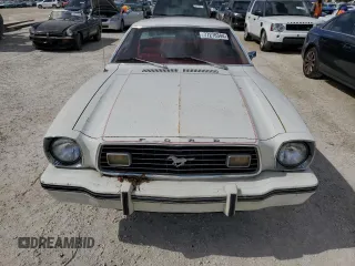 1977 Ford Mustang z VIN 7F04Z150204, wystawiony jako Copart lot #77276344 z przebiegiem 94 802 mil mil oraz Szkoda całkowita • Salvage title. Historia ofert i sprzedaży dostępna na DreamBid. Obrazek 5.