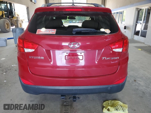 2013 Hyundai Tucson GLS with VIN KM8JU3AC7DU614962, listed as a Copart auction lot 51957675 with 112,942 mi miles and Salvage Title. Bid and sale history available at carsss.com. Image 6.