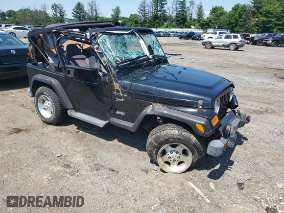 2002 Jeep Wrangler Sport with VIN 1J4FA49S02P721457, listed as a Copart auction lot 61726855 with 76,191 mi miles and Salvage title. Bid and sale history available at DreamBid. Image 4.
