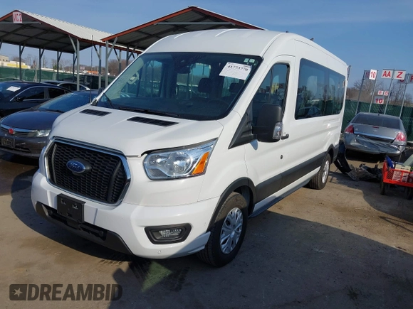2021 Ford Transit Passenger XL with VIN 1FBAX2C89MKA49631, listed as a IAAI auction lot 41773770 with 77,260 mi miles and . Bid and sale history available at DreamBid. Image 2.