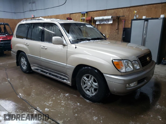 2001 Lexus LX 470 z VIN JTJHT00W213507042, wystawiony jako Copart lot #84236804 z przebiegiem 179 706 mil mil oraz Tytuł czysty. Historia ofert i sprzedaży dostępna na DreamBid. Obrazek 4.