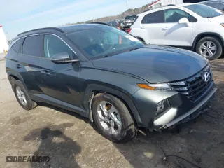 2022 Hyundai Tucson SEL with VIN 5NMJBCAEXNH031855, listed as a IAAI auction lot 41677386 with 40,606 mi miles. Bid and sale history available at carsss.com. Image 1.