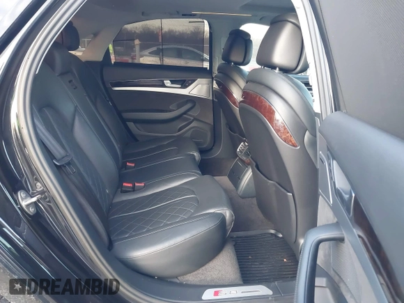 2015 Audi S8 with VIN WAUK2AFD5FN027013, listed as a IAAI auction lot 41456289 with 77,877 mi miles. Bid and sale history available at carsss.com. Image 8.