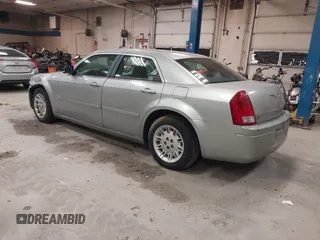 2005 Chrysler 300 with VIN 2C3JA43R55H569369, listed as a IAAI auction lot 41132751 with 123,253 mi miles. Bid and sale history available at carsss.com. Image 3.