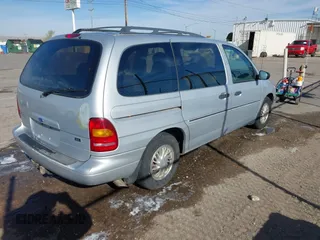 1998 Ford Windstar GL with VIN 2FMDA5144WBA72335, listed as a IAAI auction lot 41750719 with 124,803 mi miles and . Bid and sale history available at carsss.com. Image 4.