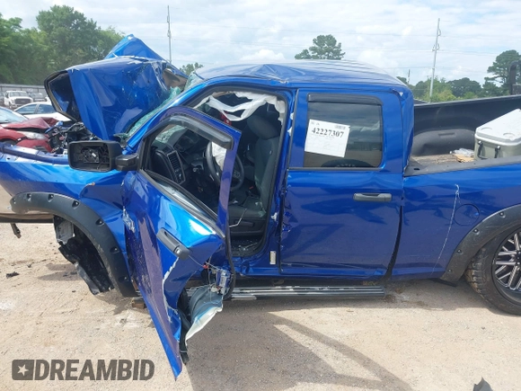 2019 Ram 1500 Tradesman z VIN 1C6RR6FG0KS712690, wystawiony jako IAAI lot #42227307 z przebiegiem Nie podano mil oraz . Historia ofert i sprzedaży dostępna na DreamBid. Obrazek 14.
