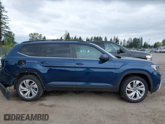 2021 Volkswagen Atlas SE z VIN 1V2WR2CA7MC568779, wystawiony jako IAAI lot #42132709 z przebiegiem 51 205 mil mil oraz . Historia ofert i sprzedaży dostępna na DreamBid. Obrazek 12.