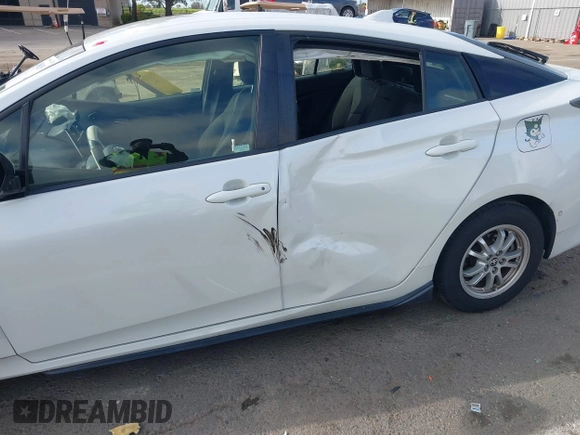 2017 Toyota Prius Two with VIN JTDKARFU9H3050782, listed as a IAAI auction lot 41988295 with 103,009 mi miles and . Bid and sale history available at DreamBid. Image 18.