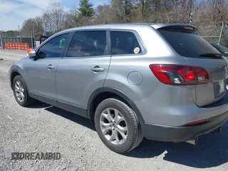 2015 Mazda CX-9 Sport with VIN JM3TB2BA7F0450544, listed as a IAAI auction lot 41812565 with 81,727 mi miles and . Bid and sale history available at carsss.com. Image 3.