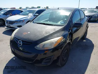 2012 Mazda 2 Sport with VIN JM1DE1KZ0C0146875, listed as a IAAI auction lot 41974461 with 211,414 mi miles. Bid and sale history available at carsss.com. Image 2.