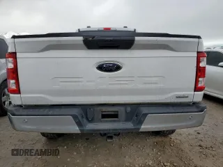 2021 Ford F-150 XL with VIN 1FTMF1EP8MKE68354, listed as a Copart auction lot 84733944 with 97,313 mi miles and Salvage title. Bid and sale history available at DreamBid. Image 6.