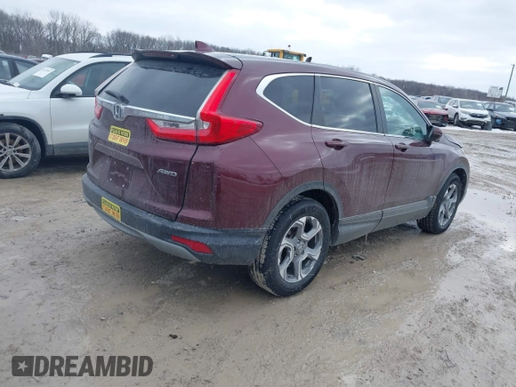 2018 Honda CR-V EX-L z VIN 2HKRW2H87JH698848, wystawiony jako IAAI lot #41624159 z przebiegiem 62 198 mil mil oraz . Historia ofert i sprzedaży dostępna na DreamBid. Obrazek 4.