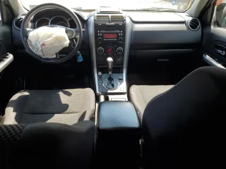 2011 Suzuki Grand Vitara Premium z VIN JS3TD0D29B4103041, wystawiony jako Copart lot #62066985 z przebiegiem 219 727 mil mil oraz Szkoda całkowita • Salvage title. Historia ofert i sprzedaży dostępna na DreamBid. Obrazek 8.