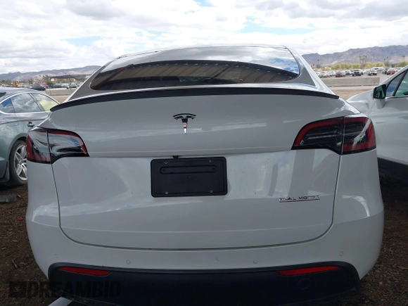 2022 Tesla Model Y Performance with VIN 7SAYGDEF4NF449986, listed as a IAAI auction lot 41754916 with 64,384 mi miles and . Bid and sale history available at DreamBid. Image 17.