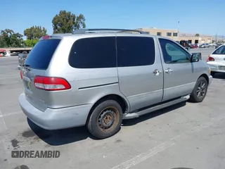 2001 Toyota Sienna LE with VIN 4T3ZF13C91U384987, listed as a IAAI auction lot 42531543 with 265,280 mi miles and . Bid and sale history available at DreamBid. Image 4.