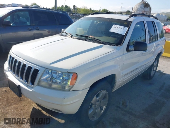 2001 Jeep Grand Cherokee Limited with VIN 1J4GW58S41C615418, listed as a IAAI auction lot 42141143 with 148,145 mi miles. Bid and sale history available at carsss.com. Image 2.