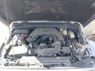 2018 Jeep Wrangler Unlimited Sahara z VIN 1C4HJXEG2JW124882, wystawiony jako IAAI lot #42437816 z przebiegiem Nie podano mil oraz . Historia ofert i sprzedaży dostępna na DreamBid. Obrazek 10.