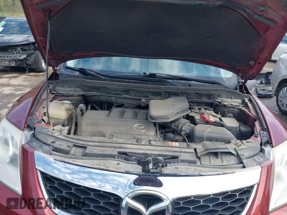 2011 Mazda CX-9 Grand Touring z VIN JM3TB2DA6B0310296, wystawiony jako IAAI lot #42022744 z przebiegiem 163 889 mil mil oraz . Historia ofert i sprzedaży dostępna na DreamBid. Obrazek 10.