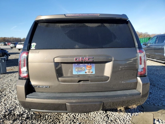 2015 GMC Yukon SLT with VIN 1GKS1BKC8FR664001, listed as a Copart auction lot 84391784 with 0 mi miles and Salvage Title. Bid and sale history available at carsss.com. Image 6.