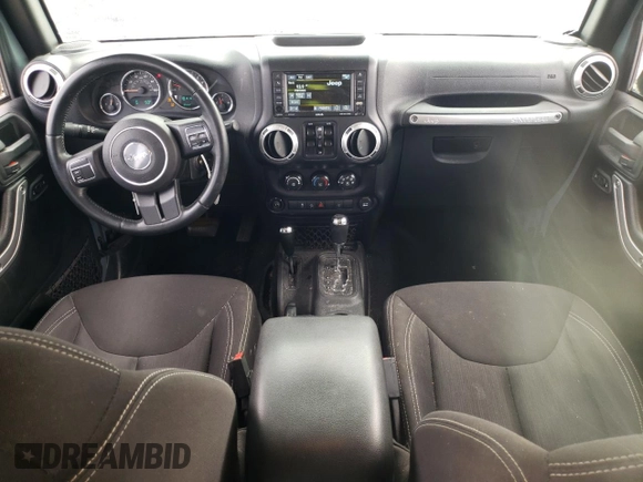 2015 Jeep Wrangler Unlimited Sahara with VIN 1C4BJWEG6FL640316, listed as a Copart auction lot 48024865 with 128,317 mi miles and Salvage Title. Bid and sale history available at carsss.com. Image 8.
