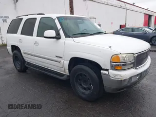 2003 GMC Yukon SLT z VIN 1GKEC13T73R281551, wystawiony jako IAAI lot #41522305 z przebiegiem 214 489 mil mil oraz . Historia ofert i sprzedaży dostępna na DreamBid. Obrazek 1.