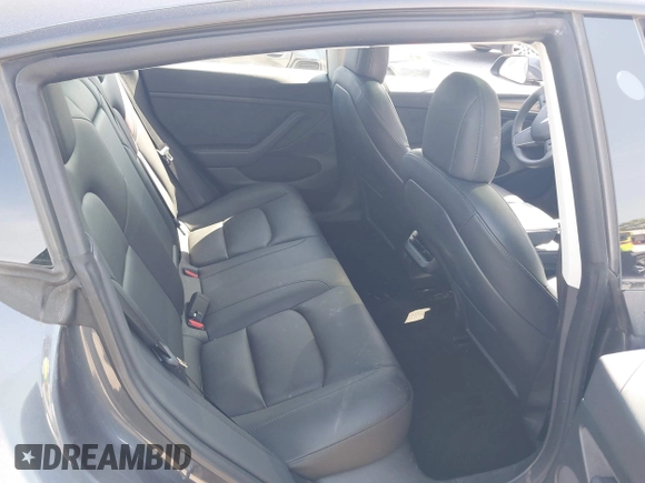 2023 Tesla Model 3 z VIN 5YJ3E1EA5PF401299, wystawiony jako IAAI lot #41968352 z przebiegiem 20 541 mil mil oraz . Historia ofert i sprzedaży dostępna na DreamBid. Obrazek 8.