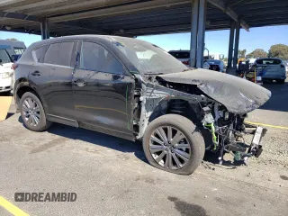 2024 Mazda CX-5 2.5 Turbo Signature with VIN JM3KFBXY4R0388868, listed as a Copart auction lot 73435824 with 5,540 mi miles and Salvage Title. Bid and sale history available at carsss.com. Image 4.