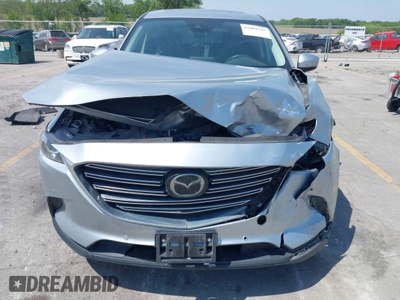 2020 Mazda CX-9 Touring with VIN JM3TCBCY2L0415513, listed as a IAAI auction lot 42481543 with 47,294 mi miles and . Bid and sale history available at DreamBid. Image 6.