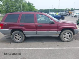 2000 Jeep Grand Cherokee Laredo z VIN 1J4GW48S2YC288439, wystawiony jako IAAI lot #42492798 z przebiegiem 272 527 mil mil oraz . Historia ofert i sprzedaży dostępna na DreamBid. Obrazek 12.