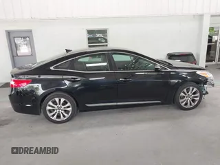 2014 Hyundai Azera Limited с VIN KMHFH4JG0EA362302, выставлен на аукционе IAAI как лот 42422140 с пробегом 120 303 миль миль и . История ставок и продаж доступна на DreamBid. Изображение 14.