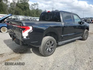 2022 Ford F-150 Lightning Pro z VIN 1FT6W1EV4NWG14041, wystawiony jako Copart lot #85252844 z przebiegiem 31 093 mil mil oraz Szkoda całkowita • Salvage title. Historia ofert i sprzedaży dostępna na DreamBid. Obrazek 3.