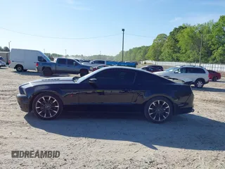 2013 Ford Mustang GT z VIN 1ZVBP8CF2D5284157, wystawiony jako IAAI lot #42050829 z przebiegiem 147 221 mil mil oraz . Historia ofert i sprzedaży dostępna na DreamBid. Obrazek 14.