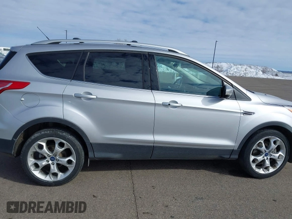 2015 Ford Escape Titanium with VIN 1FMCU9J97FUA05003, listed as a IAAI auction lot 41721214 with 51,644 mi miles. Bid and sale history available at carsss.com. Image 13.