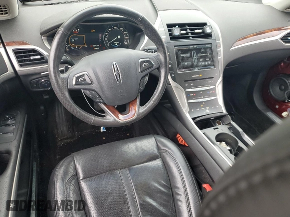 2014 Lincoln MKZ with VIN 3LN6L2JK7ER834055, listed as a Copart auction lot 58043045 with 56,010 mi miles and Salvage title. Bid and sale history available at DreamBid. Image 8.