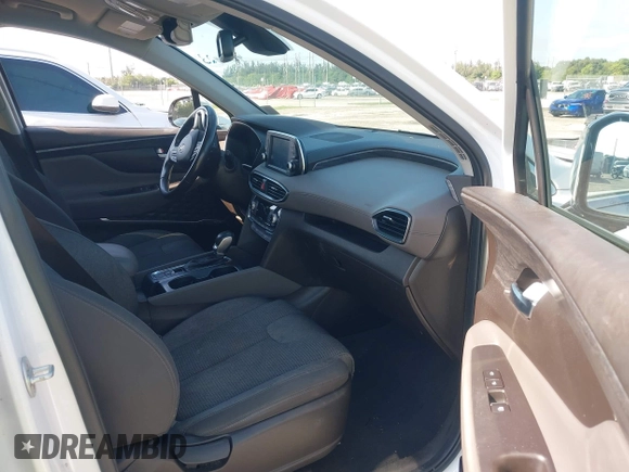 2019 Hyundai Santa Fe SEL with VIN 5NMS33AD6KH081690, listed as a IAAI auction lot 41961423 with 114,389 mi miles and . Bid and sale history available at DreamBid. Image 5.